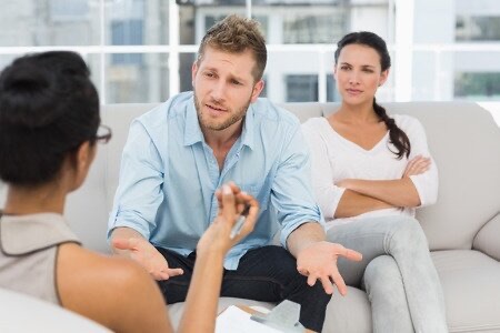 A couple talking with a counselor